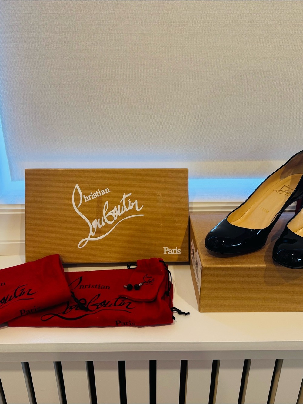 Christian Louboutin Black Patent Leather Round-Toe Pumps